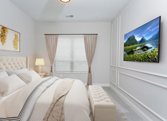 a bedroom with a large bed and a large window at Fairfax, Grandview, OH