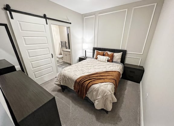 a bedroom with a bed and a dresser at Fairfax, Grandview, OH, 43212