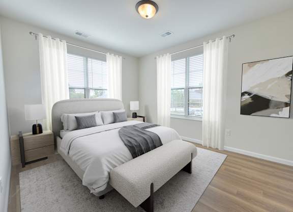 A bedroom with a large bed and a painting on the wall.