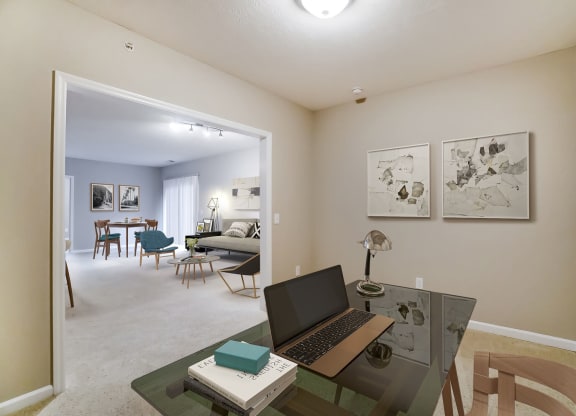 a home office with a laptop computer on a deskat Taylor House Apartments, Columbus, Ohio