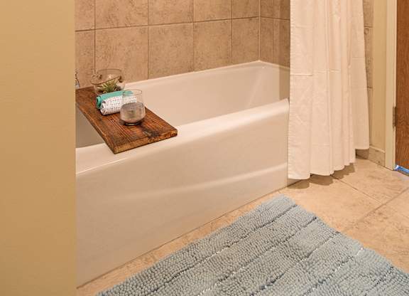 A bathroom with a Bathtub at Grand Wisconsin, Milwaukee, 53203