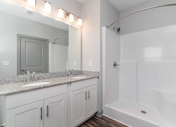 Bathroom with a bathtub and a sink at The Parker Myrtle Beach, Myrtle Beach, SC, 29588