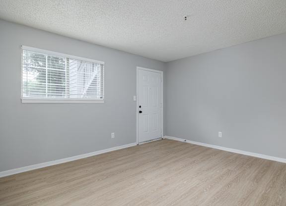 A Room With Wooden Flooring at Avondale Place Apartments, Georgia