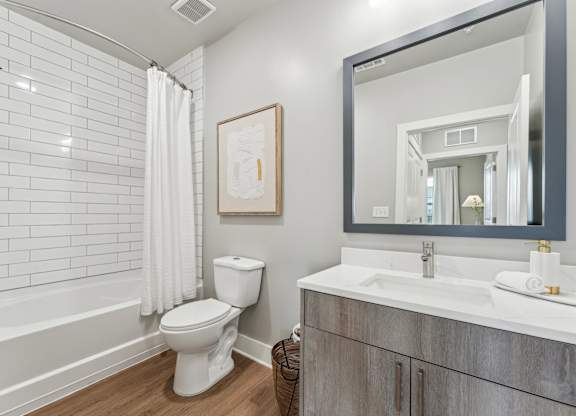bathroom with garden style tub at The Hendry Apartments, Fort Myers, FL, 33905