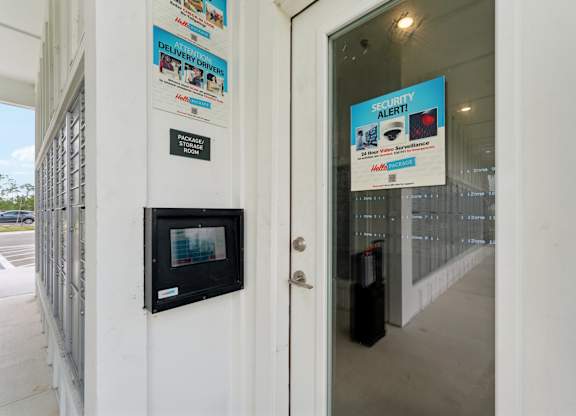 secured entry package room door at The Hendry Apartments, Fort Myers, FL, 33905
