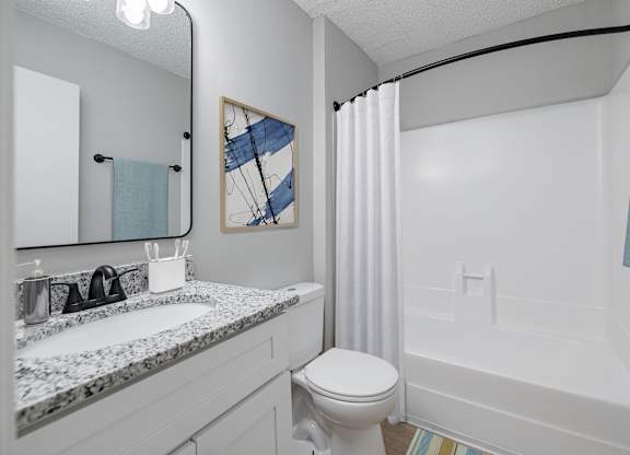 A Bathroom With Bathtub at Avondale Place Apartments, Avondale Estates, 30002