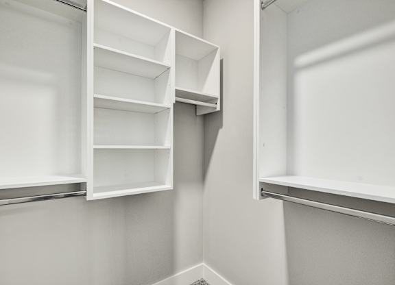 Empty white shelves in a room at The Ashton at East Park Apartments, Kennesaw, 30144