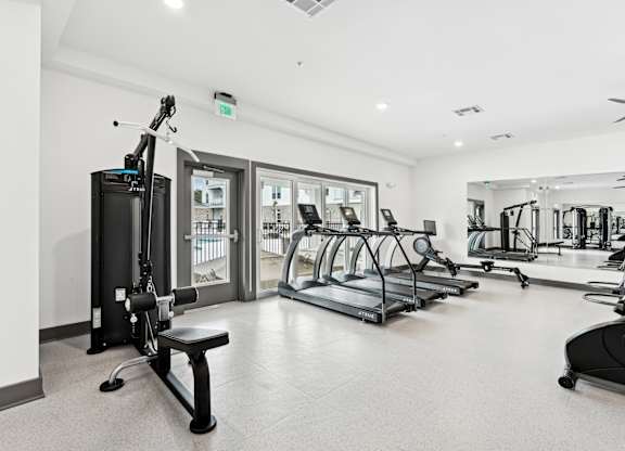 Gym with treadmills and other fitness equipment at the flats at The Leo Myrtle Beach, Myrtle Beach, SC, 29579