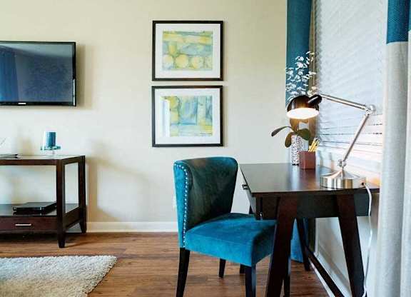 Living room with a desk at Ventana at The Lake, Hendersonville, TN.