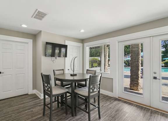 A dining room with a table and chairs  at The Taylor, Marietta, GA.