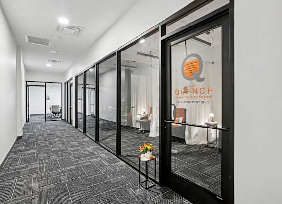 Hallway with a Glass Door at The 600 Apartments, Birmingham, Alabama