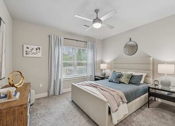Bedroom With Ceiling Fan at The Exchange at Crestview Apartments, Crestview, Florida