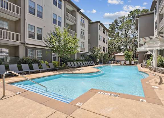 A large swimming pool surrounded by apartment buildings at Union Eleven Apartments, Atlanta, GA