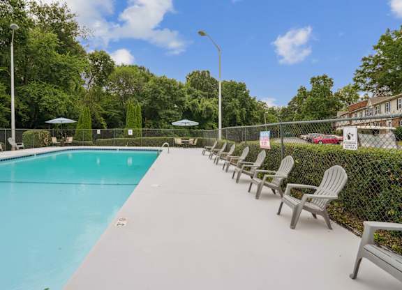 Pool with Chairs at The Highlands Apartments, North Carolina, 28217
