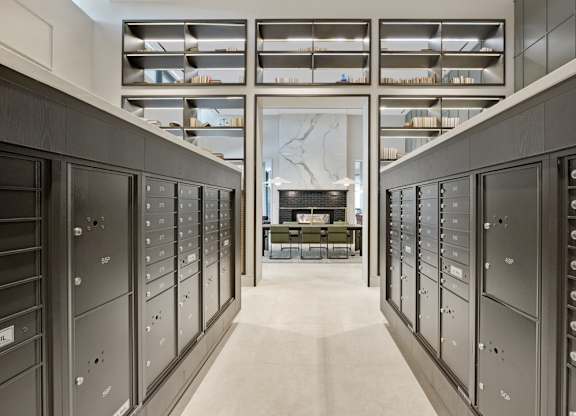 A long hallway with a row of lockers on each side.