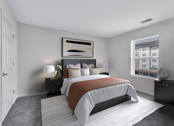 a bedroom with a bed and a window