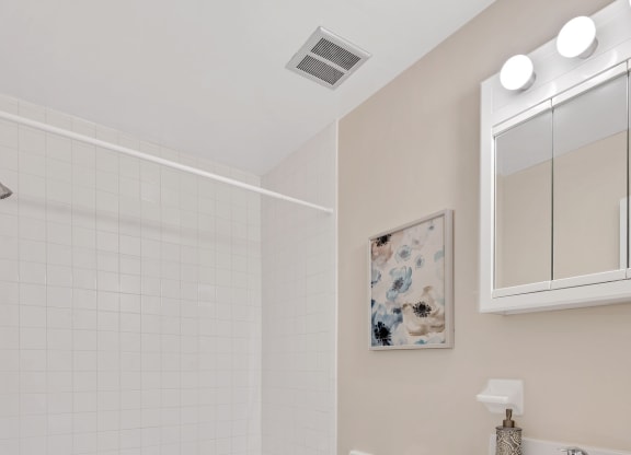 a bathroom with a toilet sink and bathtub