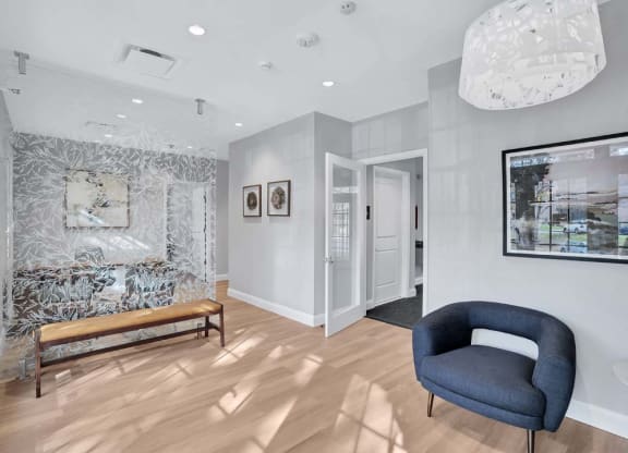 a living room with a couch and a chair