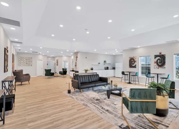 a living room filled with furniture and a large window