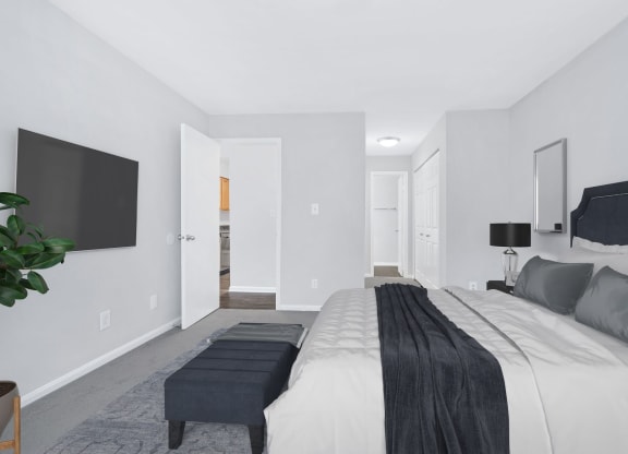 Bedroom at Waterside at Reston with walk-through closet. .
