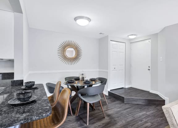 Renovated apartment homes at Waterside at Reston feature separate dining areas as well as bar seating.