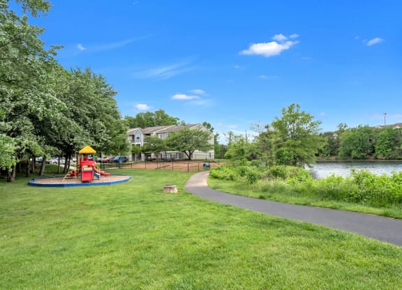 Views of the lake, playground and dog park at Waterside at Reston.