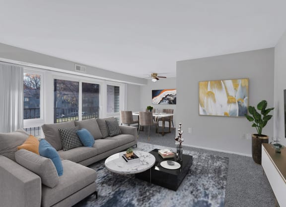 a living room with couches and a coffee table