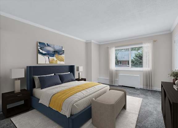 A bedroom with a large bed and a painting on the wall.