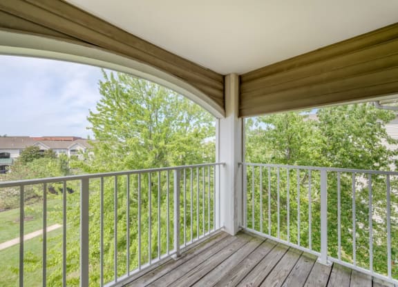 the view from the deck of a home with a balcony