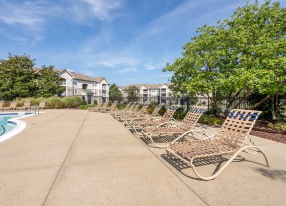 our apartments have a pool and chaise lounge chairs