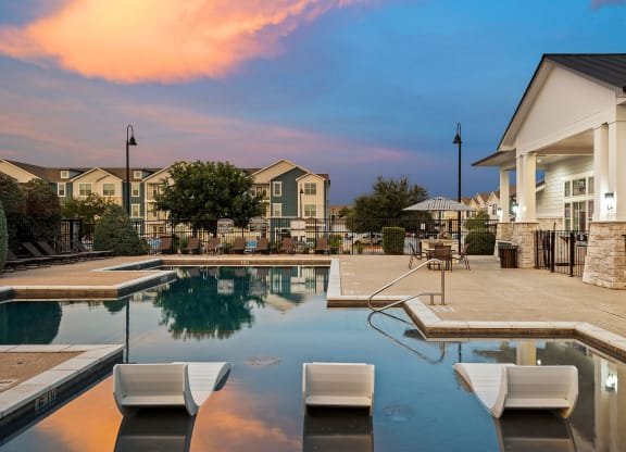 take a dip in the resort style pool at bexley tech ridge apartments