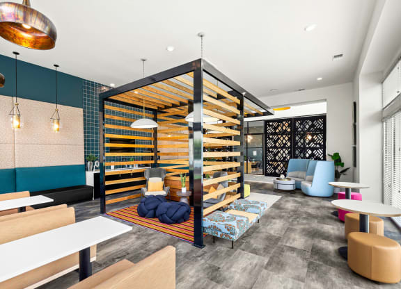 a living room with a wooden divider