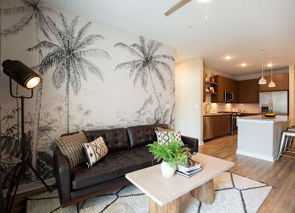 a living room with a couch and a table