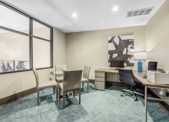 a room filled with furniture and a large window