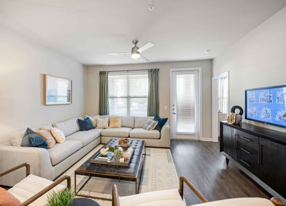 a living room with a couch and a coffee table