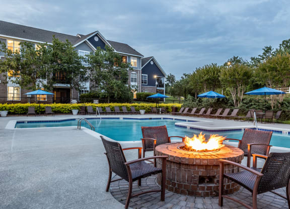 our apartments offer a swimming pool with a fire pit