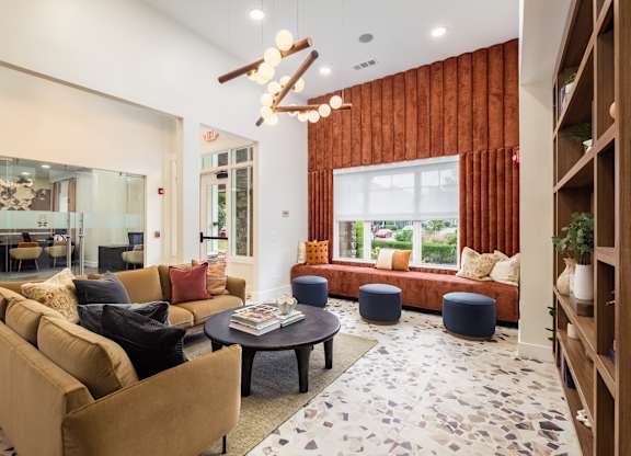 a living room with couches and a coffee table