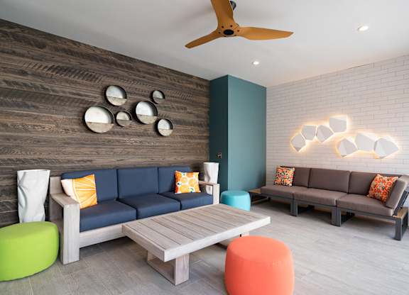 a living room with couches and a coffee table