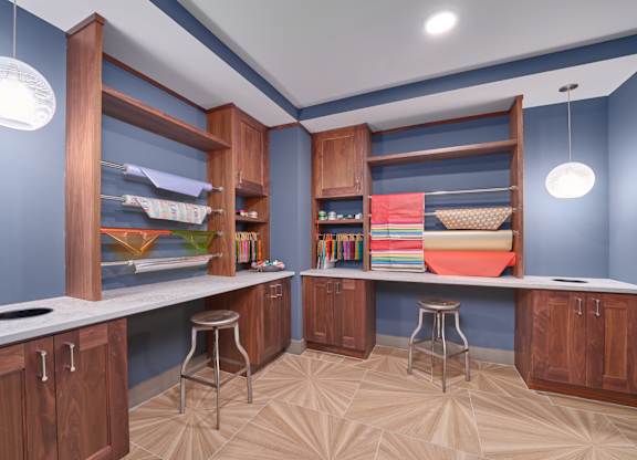 A kitchen with wooden cabinets and a countertop.