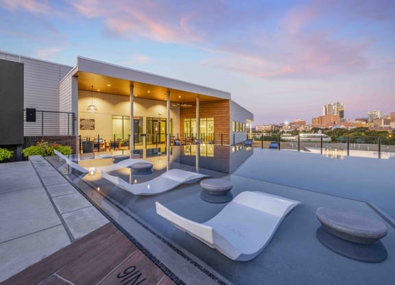 the home has a rooftop pool with views of the city