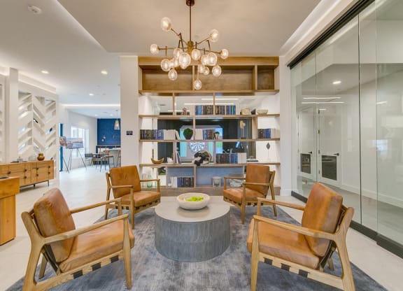 a living room filled with furniture and a table