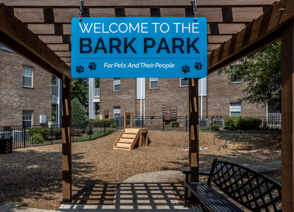 a sign that reads welcome to the bark park for kids and their people