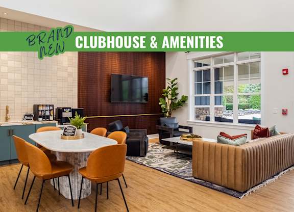 A modern clubhouse and amenities area with a dining table and chairs.
