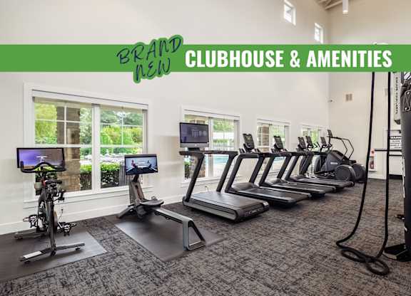 A gym with a green banner that says "Brand New Clubhouse & Amenities".
