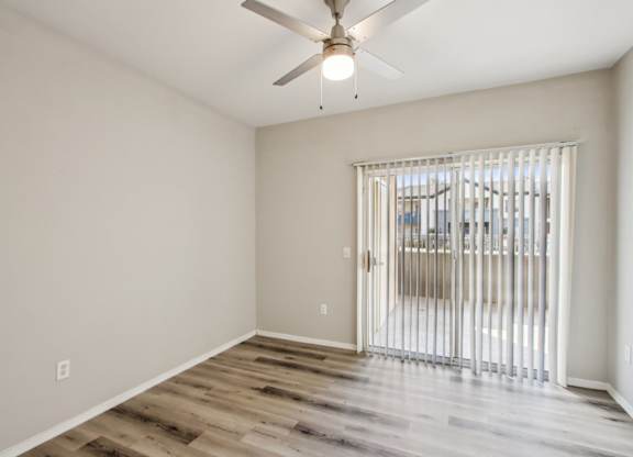 living room with large window at Sweetwater At Metro North Apartments, Arizona 85029