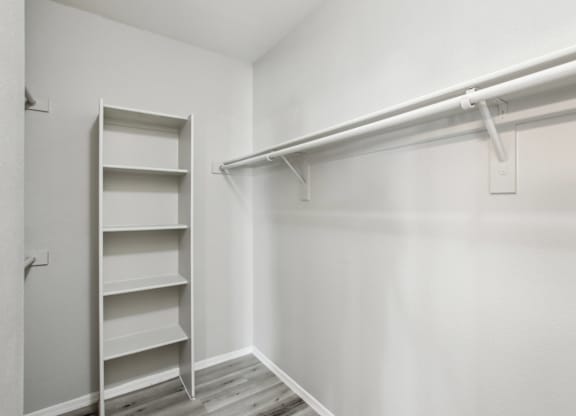A white closet with a shelf and a white door at Sweetwater At Metro North Apartments, Arizona