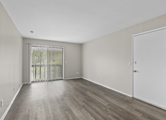 Livingroom with wood style flooring at Creve Coeur, Creve Coeur, MO