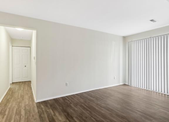 A room with wooden floors and white walls. at Millennium at Creve Coeur, Missouri, 63141