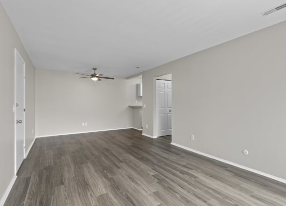 Livingroom with wood style flooring at Creve Coeur, Creve Coeur, MO
