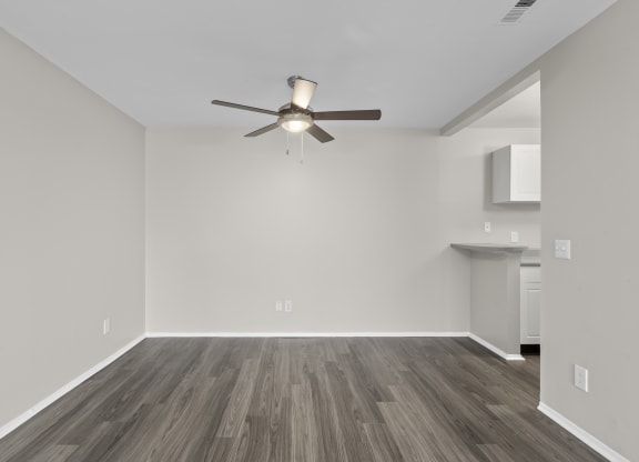 Living room with wood style flooring and a ceiling fan at Creve Coeur, Creve Coeur, MO